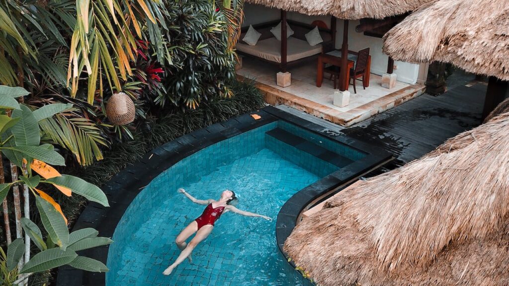 Woman soaking on the swimming pool